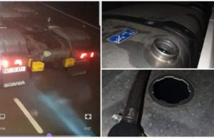 Şofer român de TIR la furat de motorină din rezervoare, în parcare, în Anglia, fotografiat de colegi