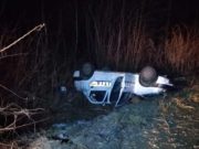 Maşină de poliţie condusă de o poliţistă, răsturnată, în Pădurea Noroieni, la Satu Mare