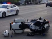 Polițist pe motocicletă, de la Brigada Rutieră, lovit de un autobuz