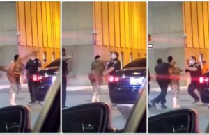 O femeie îi dă două croșee unui polițist, după care e doborâtă cu un pumn de un alt polițist