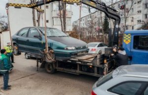 Legea care permite ridicarea anumitor masini de pe domeniul public, promulgata de Klaus Iohannis