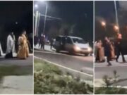 Slujbă pentru alungarea Covidului. Însoțit de boxe și un sobor de preoți, ÎPS Teodosie a luat la pas ulițele din Cogealac