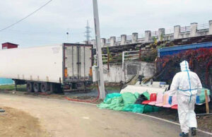 Mort de COVID-19 batjocorit la spitalul din Lugoj. Rudele l-au găsit băgat în sac într-un TIR în curte