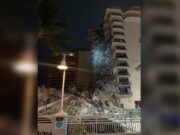 Un bloc de 11 etaje s-a prăbușit parțial. Zeci de salvatori caută supraviețuitori.