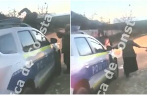 Maşina Poliţiei, distrusă cu toporul. Doi poliţişti, ameninţaţi de un bărbat