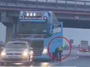 Șofer de TIR amenințat cu arma de un polițist, în mijlocul șoselei, în Arad