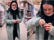 Tânără filmată când înțepa prezervativele dintr-un supermarket, apoi le-a pus înapoi pe raft