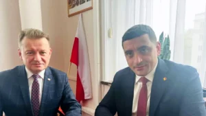 https___www.gandul.ro_wp-content_uploads_2025_05_george-simion-mariusz-blaszczak-1024x768-1