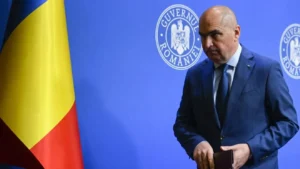 https___www.prosport.ro__wp-content_uploads_2025_08_Un-milionar-din-Romania-care-achita-sume-uriase-statului-prin-TVA-ii-bate-obrazul-premierului-Ilie-Bolojan-„De-ce-ne-omoara-pe-noi-aia-care-platim