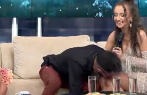 Armin Nicoară i-a sărutat, din nou, picioarele nașei! Artistul s-a aplecat deasupra femeii și a pupat-o, de față cu soția lui. Cum a reacționat Claudia Puican